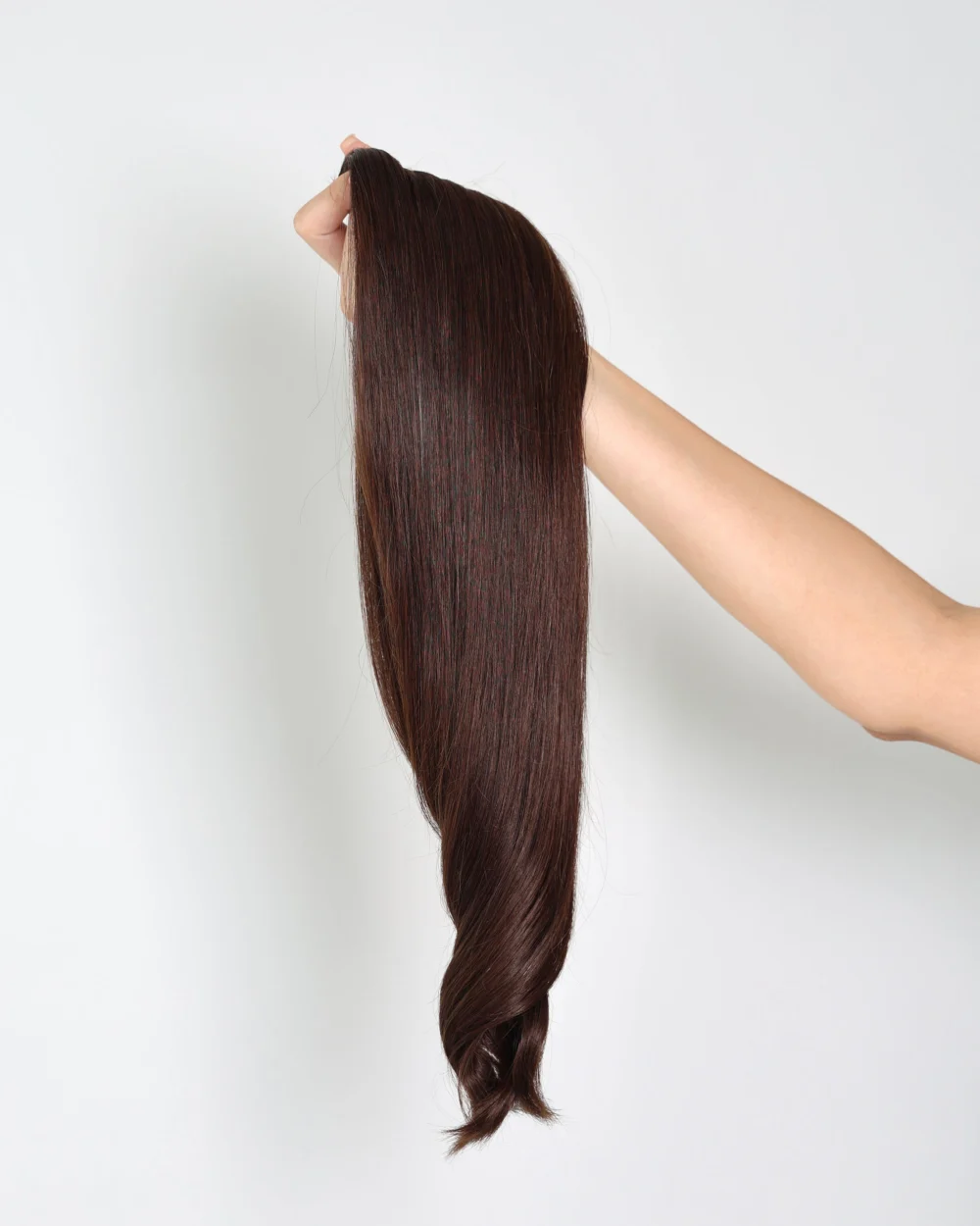 holding hair col 2 od display 20260908 Weft Extensions