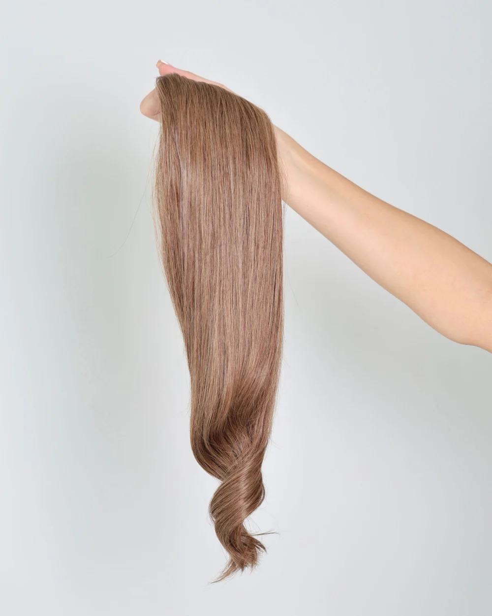 holding hair col 6 od display 20260908 Weft Extensions
