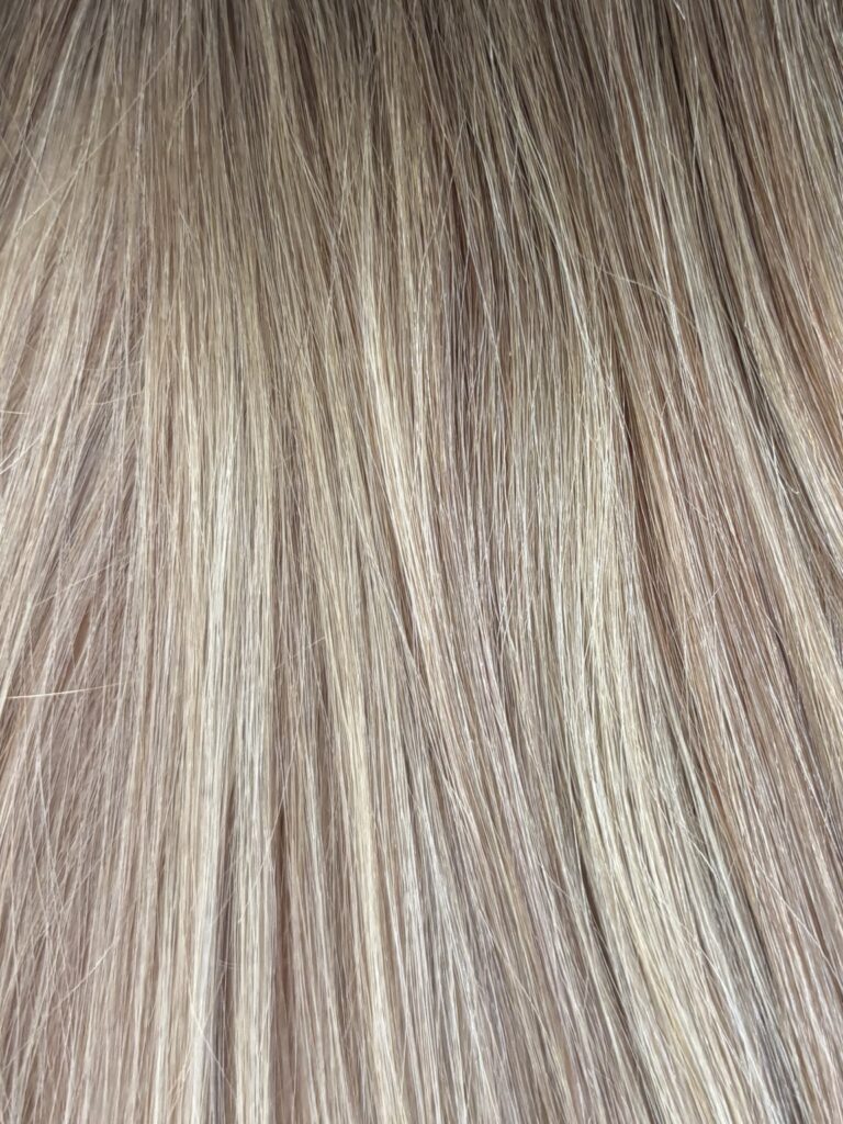 Original Diva Colour 18/60 hair extension swatch — very light brown with light blonde highlights