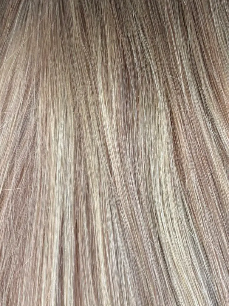 Original Diva Colour 18/60 hair extension swatch — very light brown with light blonde highlights