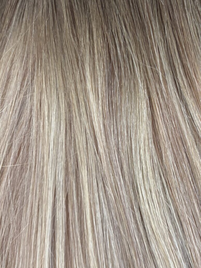 Original Diva Colour 18/60 hair extension swatch — very light brown with light blonde highlights